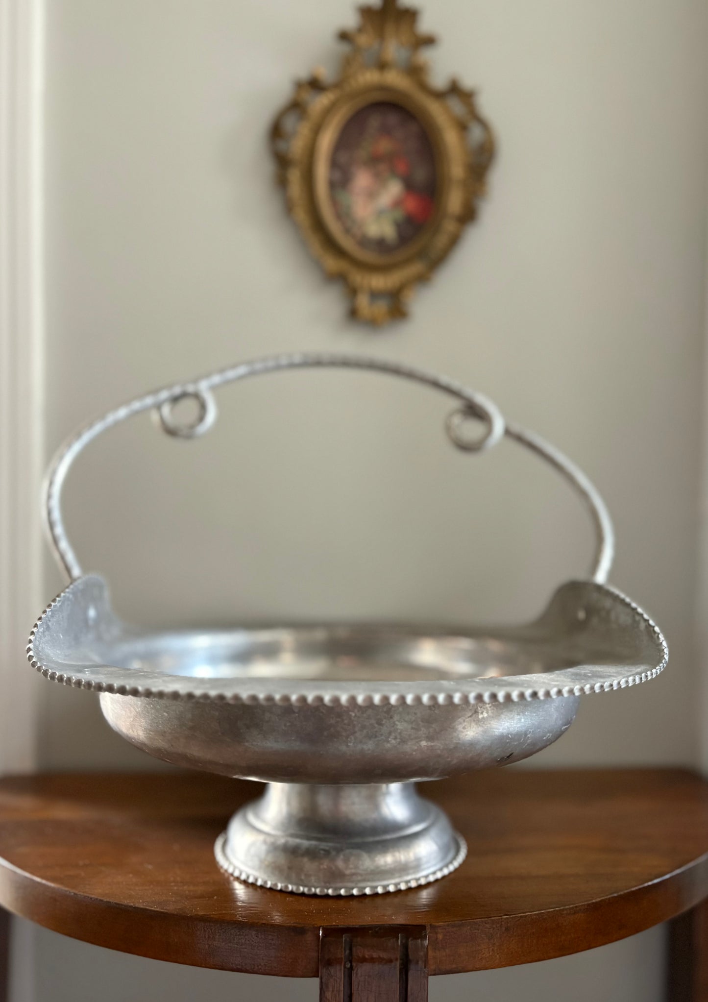 Hand Wrought Metal Pedestal Basket with Bird and Floral Design